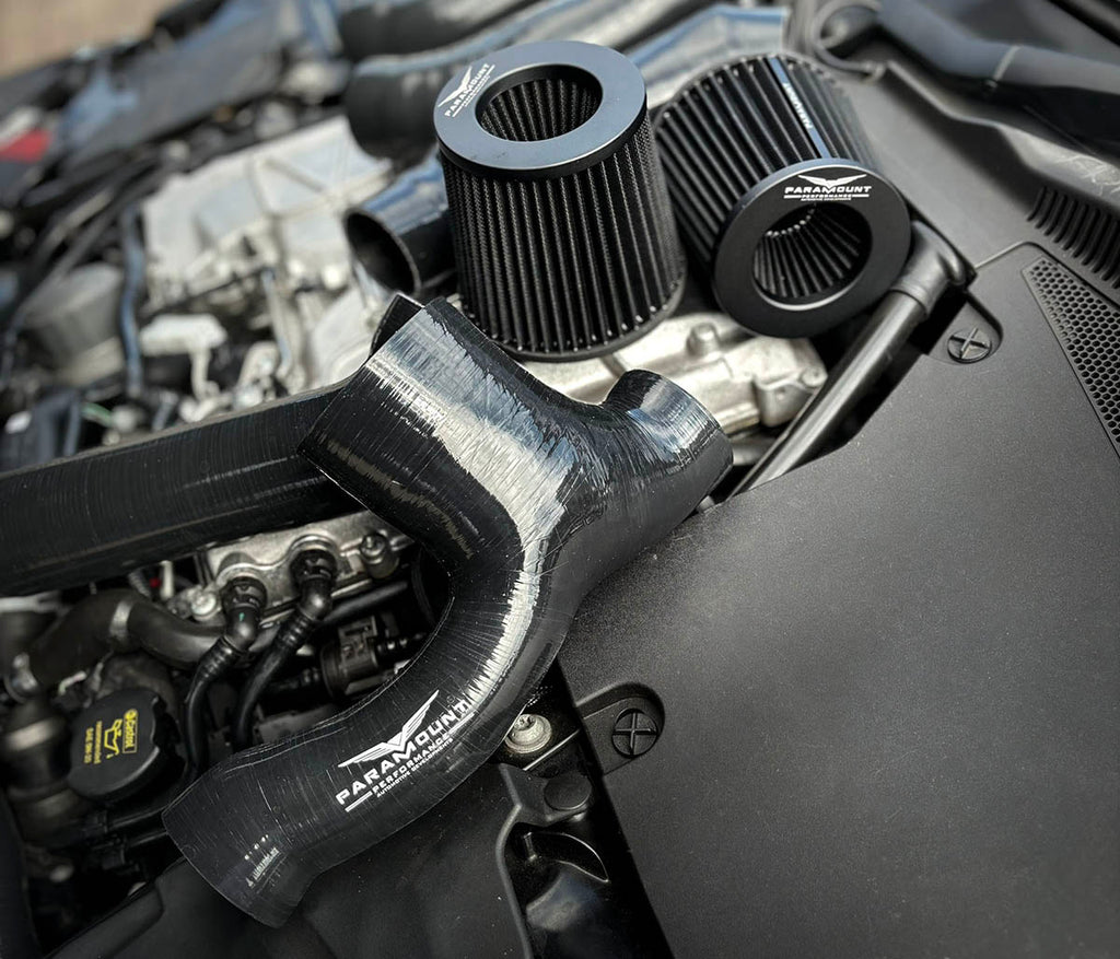 Jaguar F-Type cold air induction system silicone intake pipe and twin cone filters in engine bay