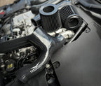 Jaguar F-Type cold air induction system silicone intake pipe and twin cone filters in engine bay