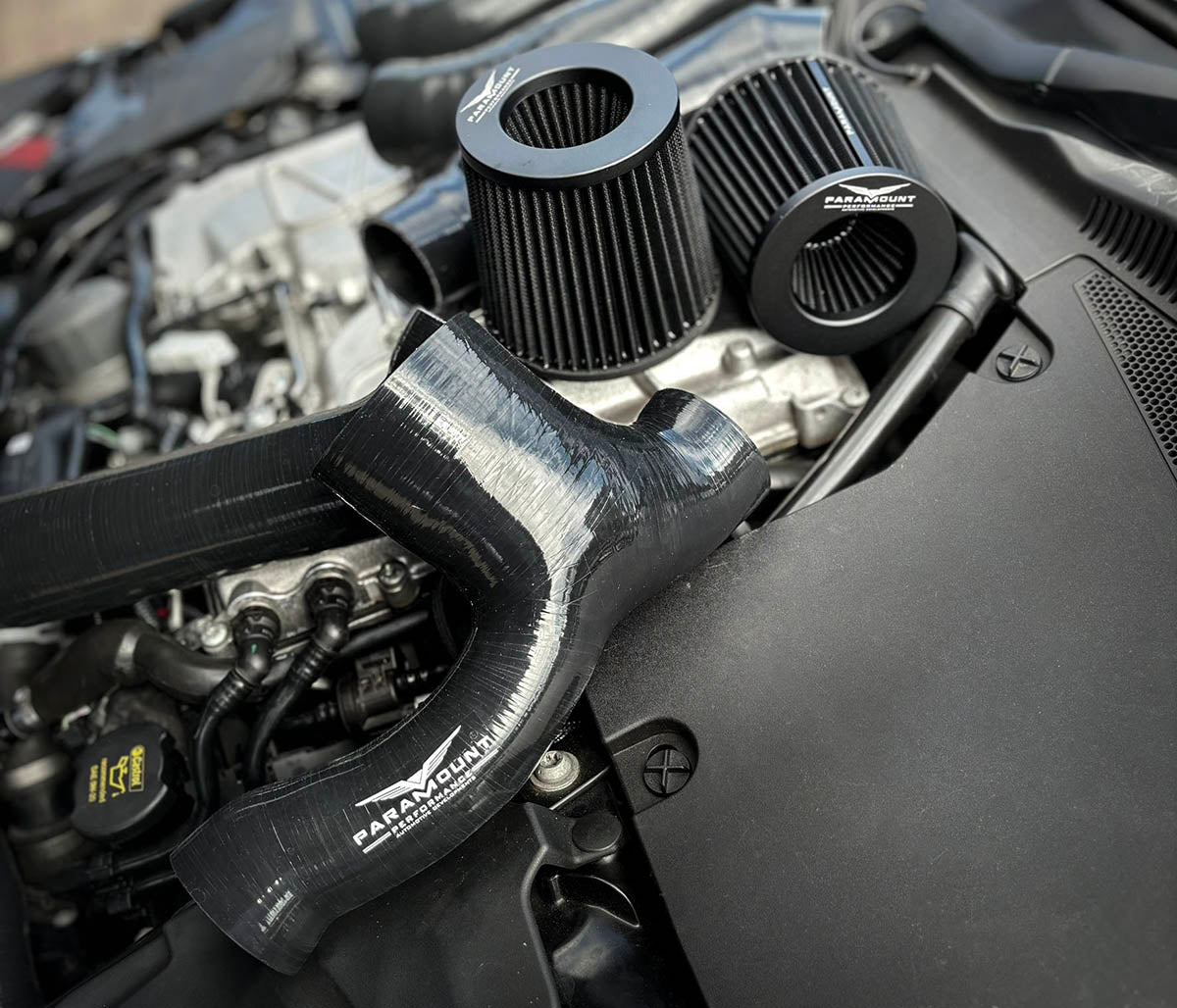 Jaguar F-Type cold air induction system silicone intake pipe and twin cone filters in engine bay