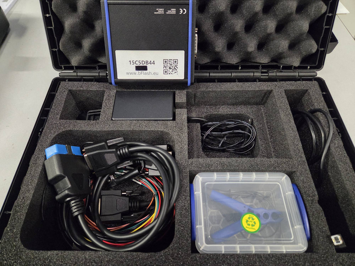 Back label of bFlash interface module in carrying case with cables and accessories
